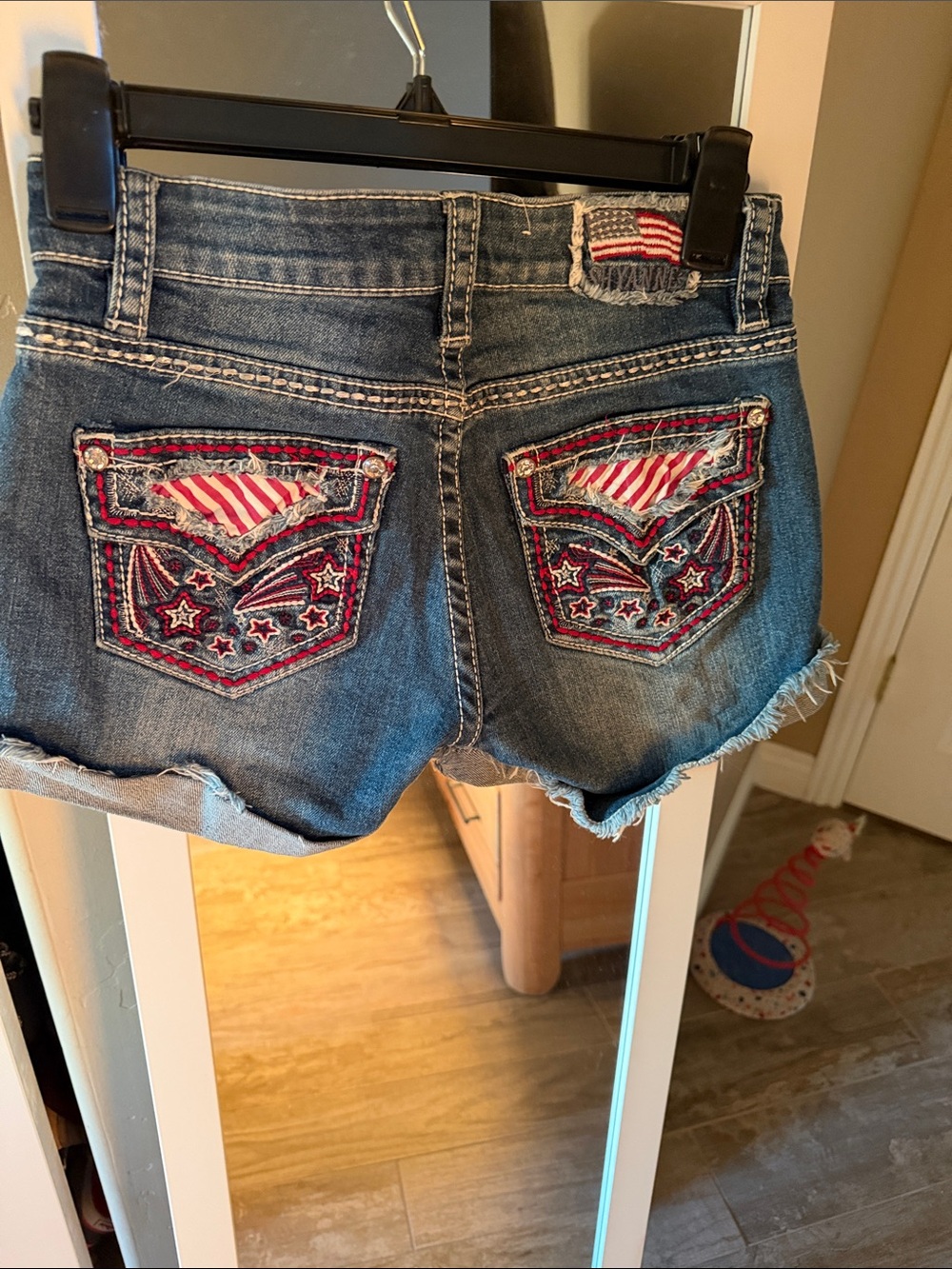 Shyanne Distressed Blue Denim Shorts with Red & White Pocket Flags